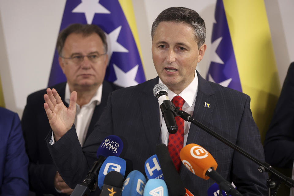 Denis Becirovic of Social Democratic Party (SDP) speaks at a news conference where he declared himself the winner of the Bosniak seat of the tripartite Bosnian Presidency in Sarajevo, Bosnia, Sunday, Oct. 2, 2022. (AP Photo/Armin Durgut)