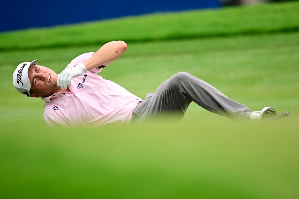 Justin Thomas reacts after a shot on the 18th green during the final round of the Wyndham Championship at Sedgefield Country Club.