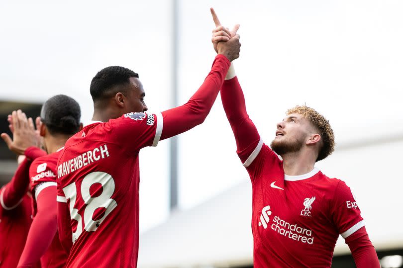 LONDON, ENGLAND - APRIL 21: Ryan Gravenberch of Liverpool celebrates with Harvey Elliott of Liverpool after scoring his side's second goal during the Premier League match between Fulham FC and Liverpool FC at Craven Cottage on April 21, 2024 in London, England.(Photo by Gaspafotos/MB Media/Getty Images)
