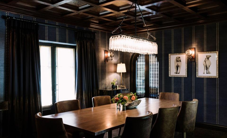 Dark, moody dining area inside Leonardo DiCaprio's new LA home.