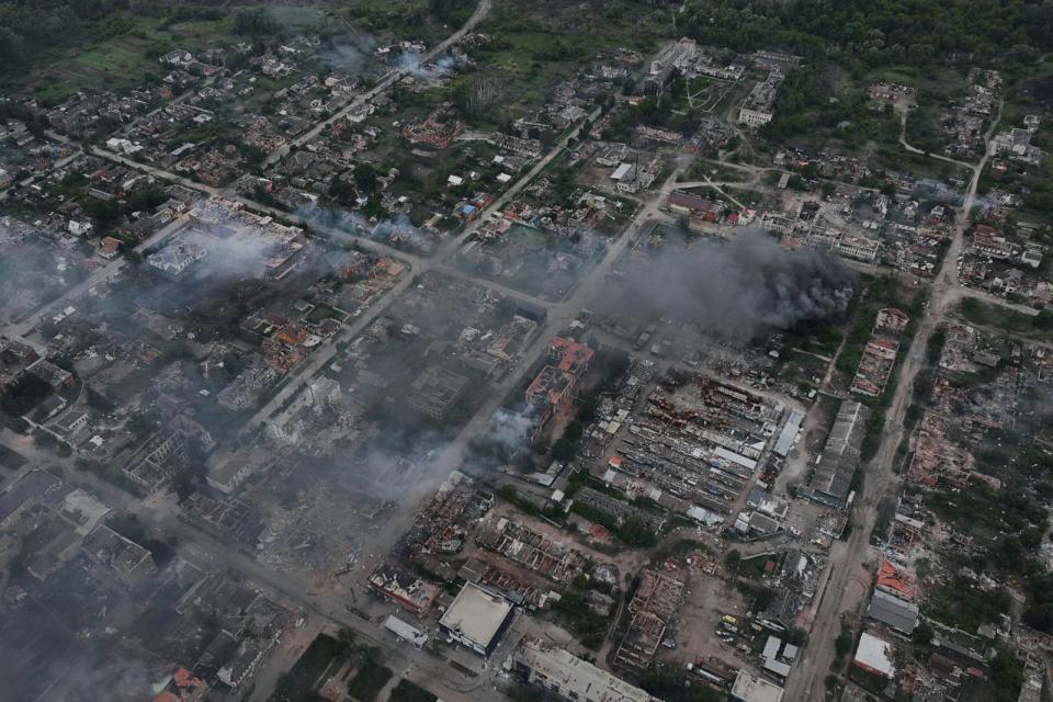 PHOTO: In this aerial view smoke rises from the Ukranian boarder city of Vovchansk, in Chuhuiv Raion, Kharkiv Oblast, which is bombarded daily by heavy artillery, May 17, 2024, in Vovchansk, Ukraine. (Libkos/Getty Images)