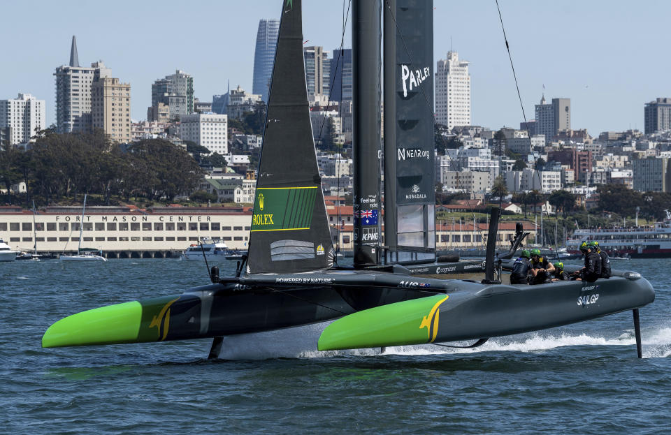 In this photo provided by SailGP, Australia SailGP Team competes in in front of the skyline on Race Day 2 of the Mubadala SailGP Season 3 Grand Final in San Francisco, Sunday, May 7, 2023. (Ricardo Pinto/SailGP via AP)