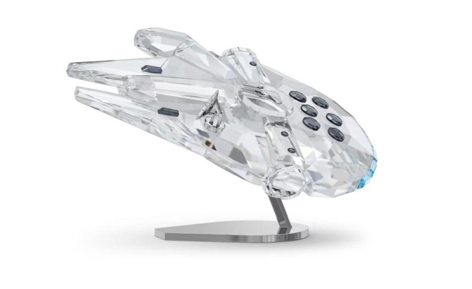 A cut crystal Swarovski Millennium Falcon display piece.