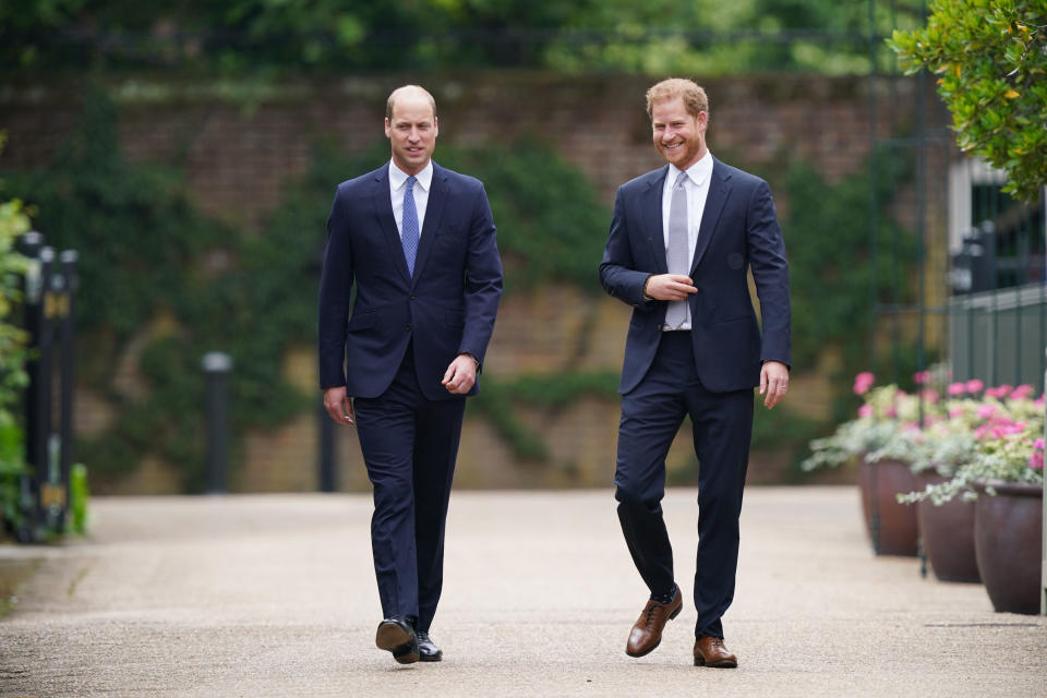 LONDON, ENGLAND - JULY 01: Prince William, Duke of Cambridge (left) and Prince Harry, Duke of Sussex arrive for the unveiling of a statue they commissioned of their mother Diana, Princess of Wales, in the Sunken Garden at Kensington Palace, on what would have been her 60th birthday on July 1, 2021 in London, England. Today would have been the 60th birthday of Princess Diana, who died in 1997. At a ceremony here today, her sons Prince William and Prince Harry, the Duke of Cambridge and the Duke of Sussex respectively, will unveil a statue in her memory. (Photo by Yui Mok - WPA Pool/Getty Images)