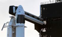 The SpaceX Crew Dragon sits atop a Falcon 9 booster rocket on Pad 39A at Kennedy Space Center before a scheduled in-flight abort test