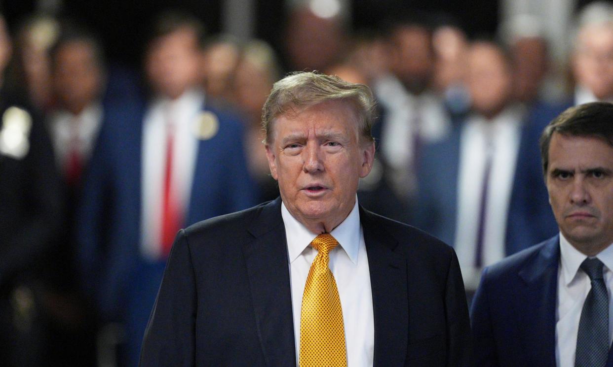 <span>Donald Trump speaks to reporters at Manhattan criminal court on Tuesday in New York, New York.</span><span>Photograph: Curtis Means/AP</span>