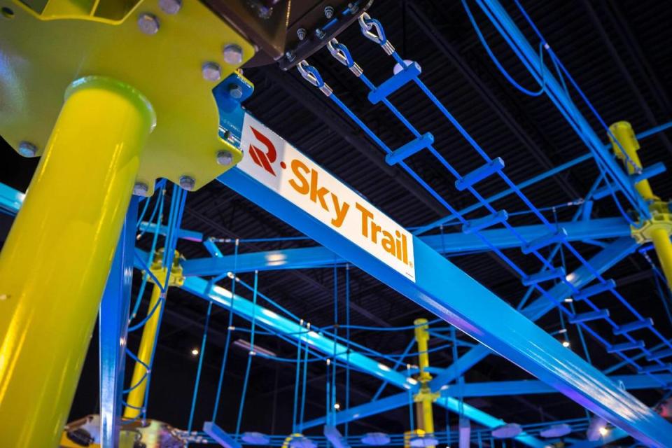 Above the arcade video games at Main Event is the Gravity Ropes aerial course and a zip line.