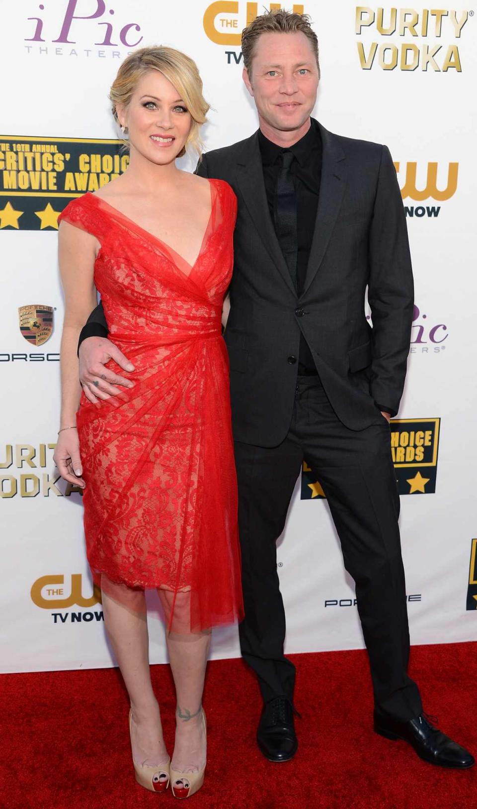 Christina Applegate (L) and musician Martyn LeNoble attend the 19th Annual Critics' Choice Movie Awards at Barker Hangar on January 16, 2014 in Santa Monica, California