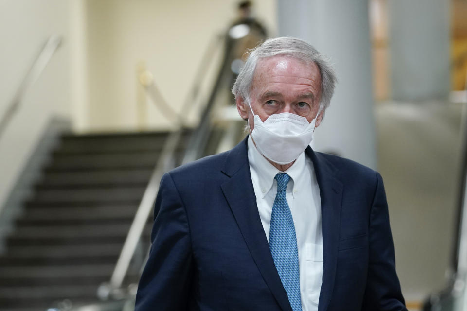 FILE - In this Feb. 12, 2021, file photo Sen. Ed Markey, D-Mass., walks on Capitol Hill in Washington after the fourth day of the second impeachment trial of former President Donald Trump. President Joe Biden’s hope of pouring billions of dollars into green infrastructure investments is running into the political obstacle of winning over Republican votes. Biden wants his infrastructure package to include ways to fight climate change. “From my perspective, no climate, no deal,” said Markey. “I won’t just vote against an infrastructure package without climate action, I’ll fight against it.″ (AP Photo/Susan Walsh, File)