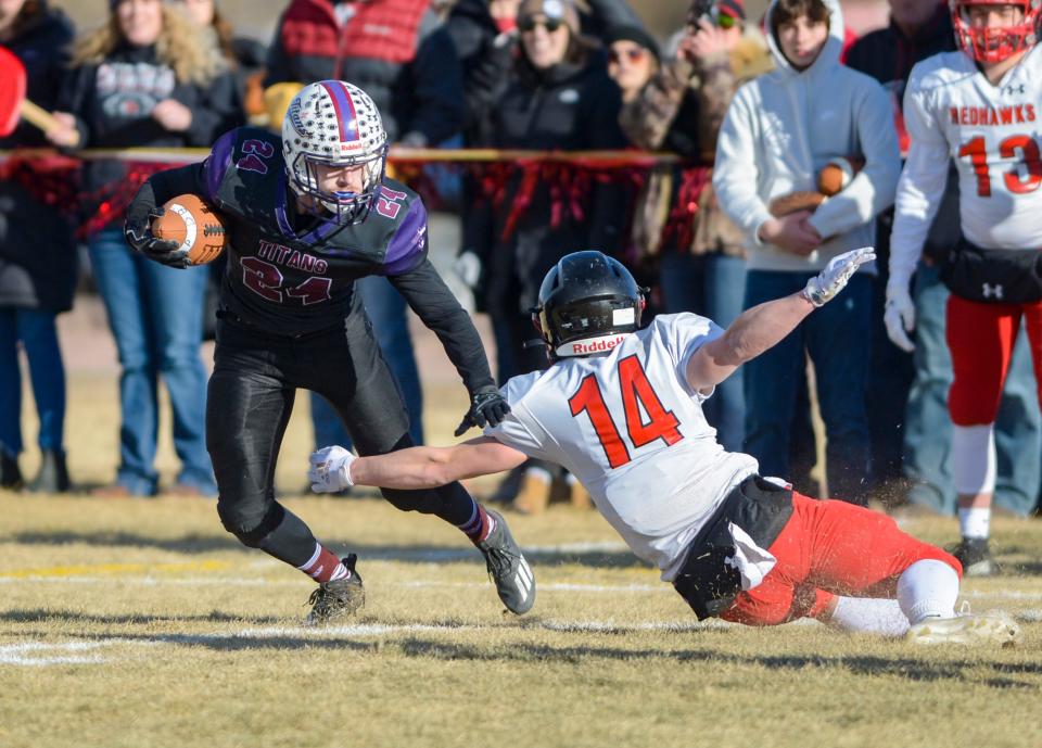 Power/Dutton/Brady's John Baringer carries the football in the 6-player football championship game against Froid/Medicine Lake on Saturday.