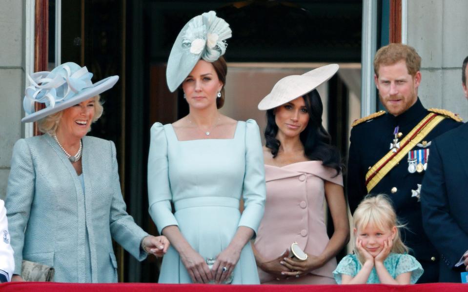 LONDON, UNITED KINGDOM - JUNE 09: (EMBARGOED FOR PUBLICATION IN UK NEWSPAPERS UNTIL 24 HOURS AFTER CREATE DATE AND TIME) Camilla, Duchess of Cornwall, Catherine, Duchess of Cambridge, Meghan, Duchess of Sussex, Prince Harry, Duke of Sussex and Isla Phillips stand on the balcony of Buckingham Palace during Trooping The Colour 2018 on June 9, 2018 in London, England. The annual ceremony involving over 1400 guardsmen and cavalry, is believed to have first been performed during the reign of King Charles II. The parade marks the official birthday of the Sovereign, even though the Queen's actual birthday is on April 21st. (Photo by Max Mumby/Indigo/Getty Images)