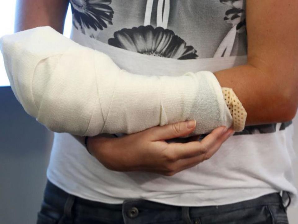 Kvitova's left arm was heavily bandaged after surgery (AP)