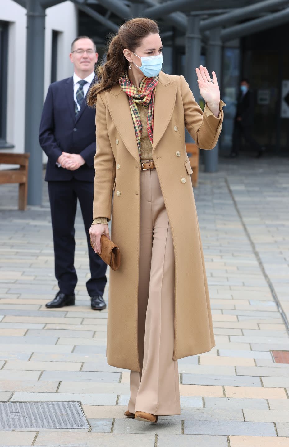 <p>In her second monochromatic look of the week, Kate chose an all-camel outfit to continue <a href="https://www.townandcountrymag.com/society/tradition/g36519274/prince-william-kate-middleton-scotland-trip-2021-photos/" rel="nofollow noopener" target="_blank" data-ylk="slk:her tour of Scotland.;elm:context_link;itc:0;sec:content-canvas" class="link ">her tour of Scotland.</a> The Duchess paired a double-breasted Massimo Dutti coat with khaki-colored wide-leg trousers, a scoop-neck sweater, and a matching brown belt, pumps, and clutch. She accessorized with a scarf in Strathearn tartan, symbolizing the couple's title in Scotland: the Earl and Countess of Strathearn.</p><p><a class="link " href="https://go.redirectingat.com?id=74968X1596630&url=https%3A%2F%2Fwww.tedbaker.com%2Fus%2FWomens%2FClothing%2FJackets-Coats%2FYECARA-Double-Breasted-Peaked-Lapel-Coat-Camel%2Fp%2F252384-CAMEL&sref=https%3A%2F%2Fwww.townandcountrymag.com%2Fstyle%2Ffashion-trends%2Fnews%2Fg1633%2Fkate-middleton-fashion%2F" rel="nofollow noopener" target="_blank" data-ylk="slk:Shop a Similar Coat;elm:context_link;itc:0;sec:content-canvas">Shop a Similar Coat</a></p>