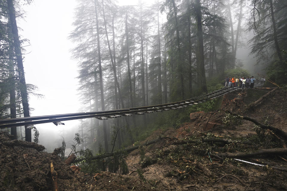 A portion of the Shimla-Kalka heritage railway track that got washed away following heavy rainfall on the outskirts of Shimla, Himachal Pradesh state, Monday, Aug.14, 2023. Heavy monsoon rains triggered floods and landslides in India's Himalayan region, leaving more than a dozen people dead and many others trapped, officials said Monday. (AP Photo/ Pradeep Kumar)