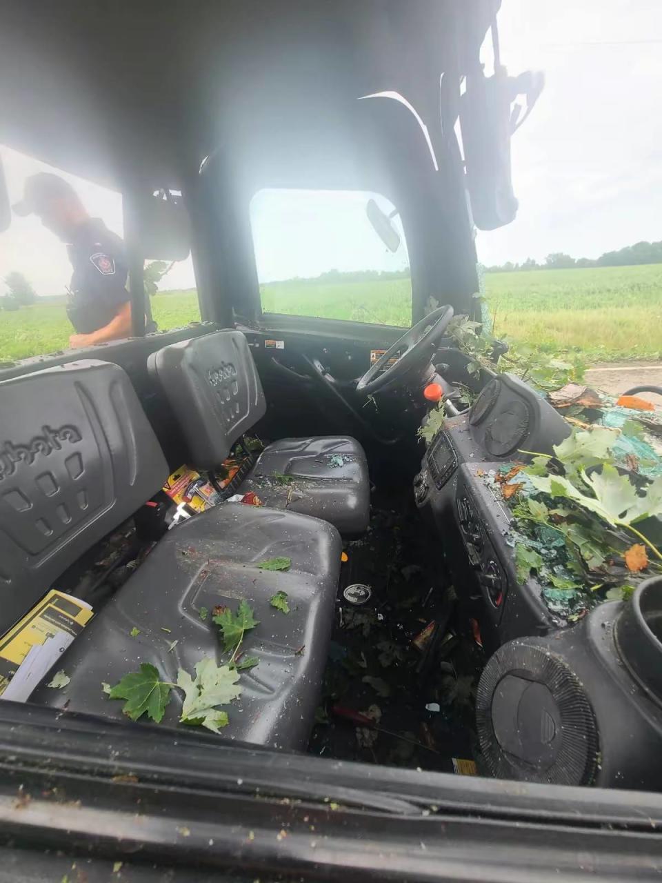 A look inside at the farm vehicle that was hit by a large tree limb during an Aug. 5 downburst in Chatham-Kent near Rondeau Provincial Park.