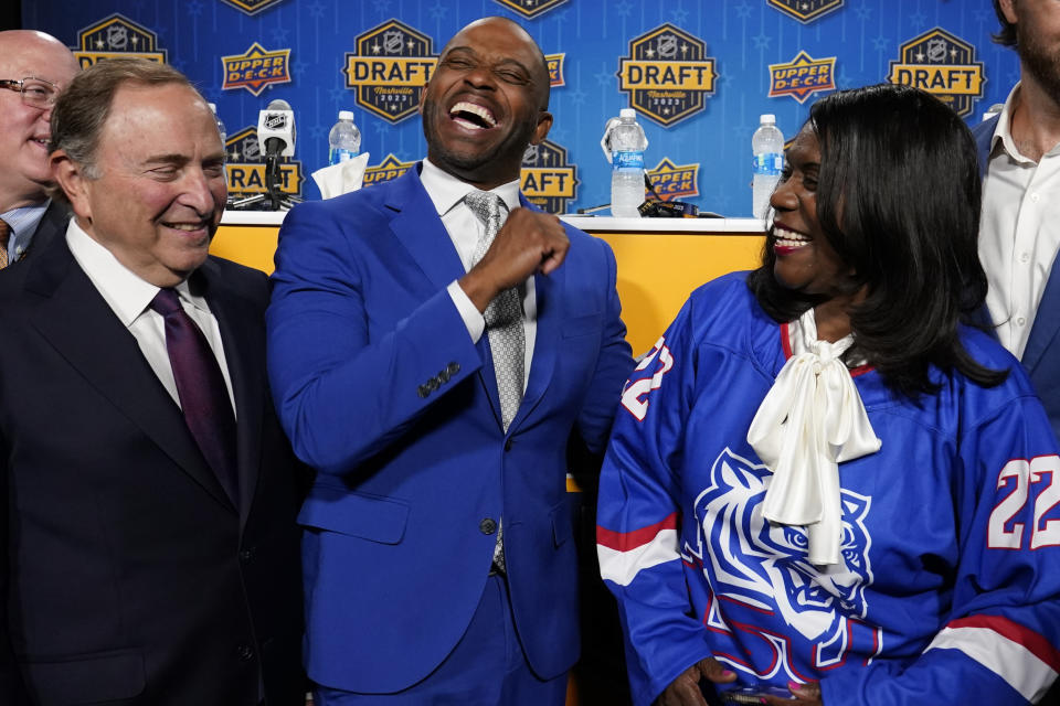 NHL Commissioner Gary Bettman, left, Tennessee State University athletic director Mikki Allen and president Glenda Glover share a laugh after a news conference, Wednesday, June 28, 2023, in Nashville, Tenn. The school announced it will become the first historically Black college and university to introduce ice hockey. The program has been created in partnership with the National Hockey League, National Hockey League Players' Association and the Nashville Predators. (AP Photo/George Walker IV)