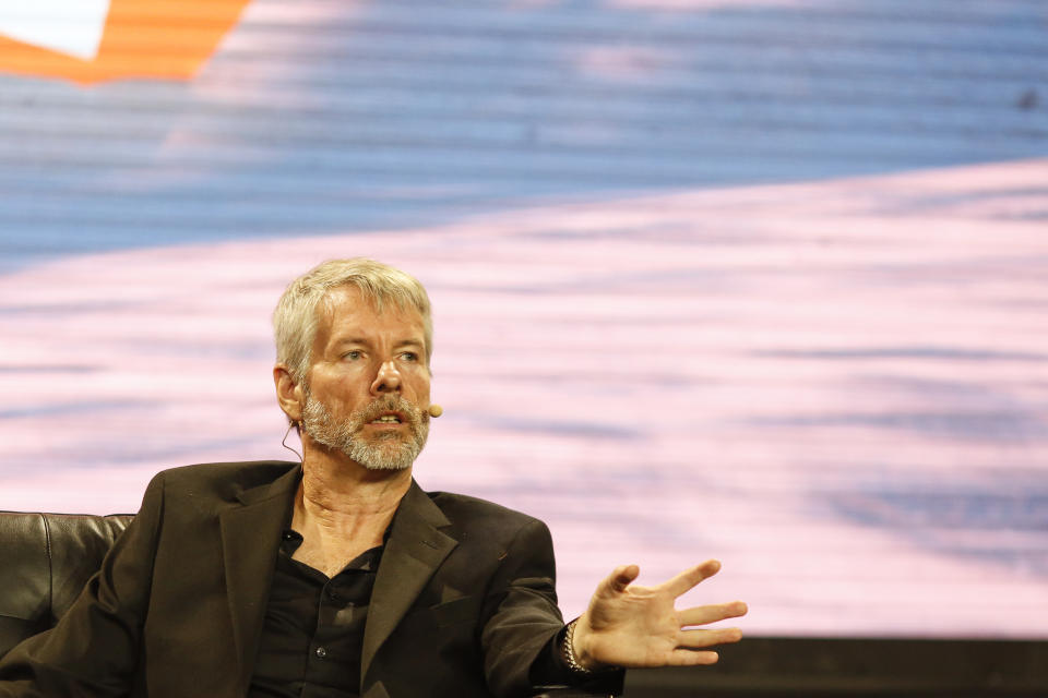 MIAMI, FLORIDA - APRIL 7: Michael Saylor, Chairman &amp; CEO, MicroStrategy, gestures as he speaks during the Bitcoin 2022 Conference at Miami Beach Convention Center on April 7, 2022 in Miami, Florida. The worlds largest bitcoin conference runs from April 6-9, expecting over 30,000 people in attendance and over 7 million live stream viewers worldwide.(Photo by Marco Bello/Getty Images)