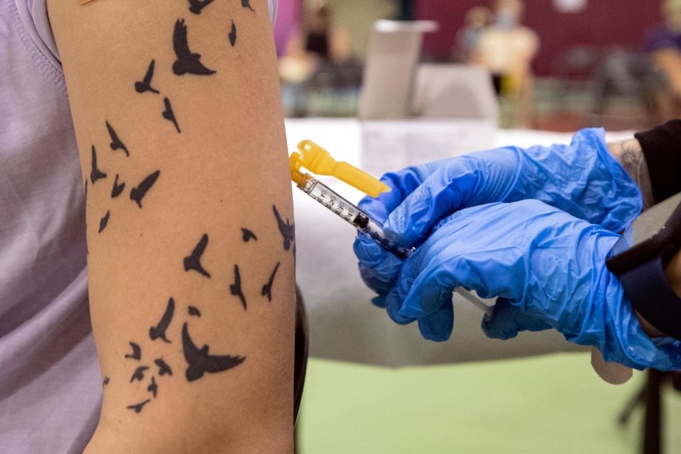 A patient is vaccinated against monkeypox at the vaccination site in Obregon Park, Los Angeles, California, this week (EPA)