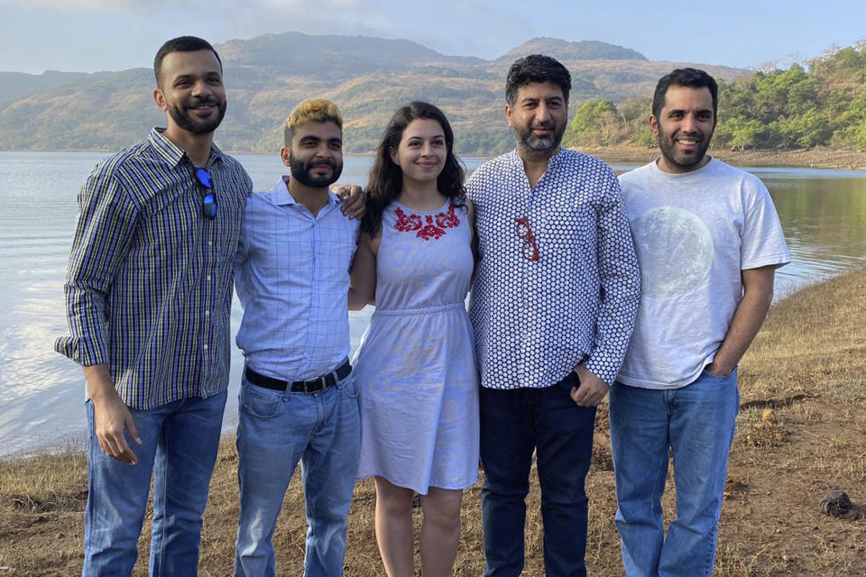 This photograph from March 2020 shows participants, from left, Zubin Gheesta, Sheherazad Pavri, Tanya Hoshi, trip leader Arzan Sam Wadia, Kayras Irani in a group trip to Lonvala, India organized by Zoroastrian Return to Roots. The aim of the trip to help young Zoroastrians from other parts of the world learn more about the culture and history of their ancient faith. (Zoroastrian Return to Roots via AP)