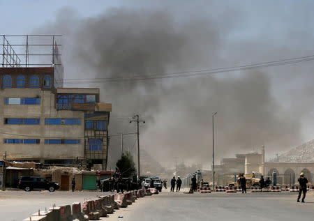 Smoke rises from the site of an attack in Kabul, Afghanistan August 21, 2018. REUTERS/Mohammad Ismail