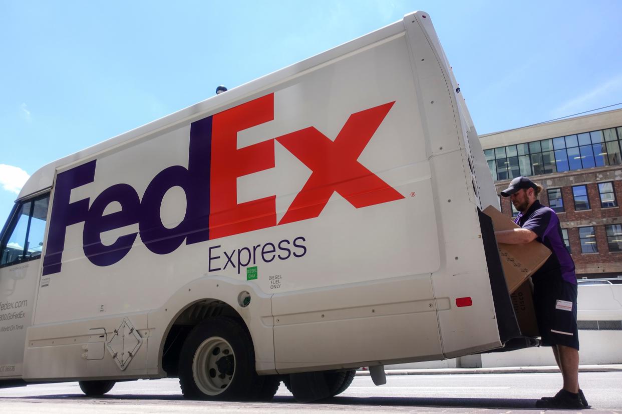 A FedEx employee in Victorville was arrested at his Hesperia home on suspicion of stealing a package containing several handguns, sheriff's officials said.