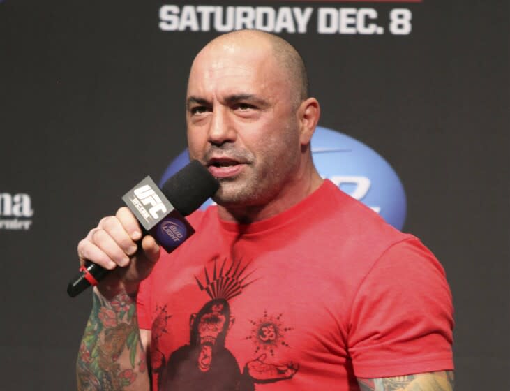 FILE - UFC announcer and podcaster Joe Rogan speaks at the weigh in before a UFC on FOX 5 event in Seattle, on Dec. 7, 2012. Spotify's CEO Daniel Ek wrote in a note to employees Sunday, Feb. 6, 2022, that while he condemned Rogan's use of racist language, he did not believe that cutting ties with the popular personality was the answer. Ek's message came a day after Rogan apologized for using racist slurs on his podcast and removed several episodes from Spotify. (AP Photo/Gregory Payan, File)