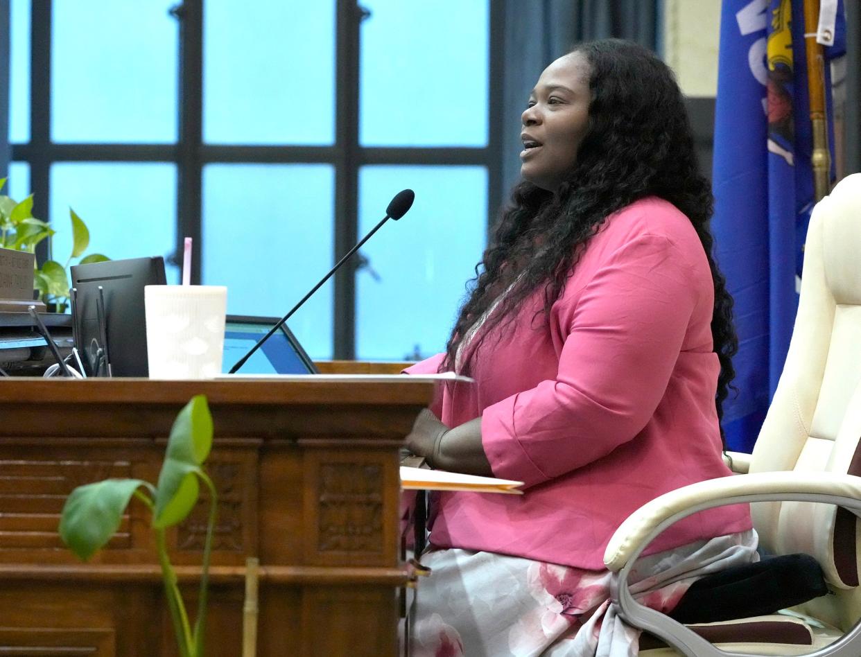 County Supervisor Sequanna Taylor takes the chair position as the Milwaukee County Board of Supervisors vote to enact a sales tax increase during a county board meeting at the Milwaukee County Courthouse in Milwaukee on Thursday.