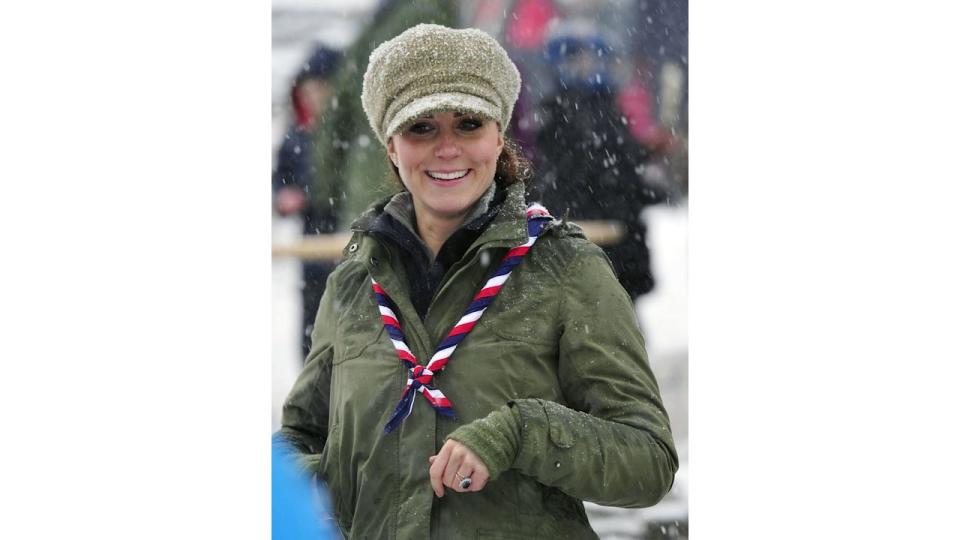 Kate Middleton, wearing a baker boy cap, arrives for a visit to the Great Tower Scout camp at Newby Bridge in Cumbria on March 22, 2013.  