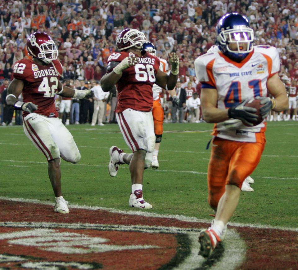 <p>This is a game that also frequently appears on lists ranking the greatest college football games ever played. It was that exciting on its own even without the added significance of a school from a non-power conference beating a traditional power like Oklahoma, which was seen as one of the nation’s best teams that season. Boise State jumped to a 28-10 lead in the third quarter, only to watch the Sooners rattle off 25 unanswered points to take a seven-point lead. The Broncos used a wild hook and lateral play to score the tying touchdown in the final seconds of regulation and an even more bold ‘Statue of Liberty’ run play for the game-winning two-point conversion in overtime. Boise State (13-0) was the one and only undefeated team in Division I football that year. </p>