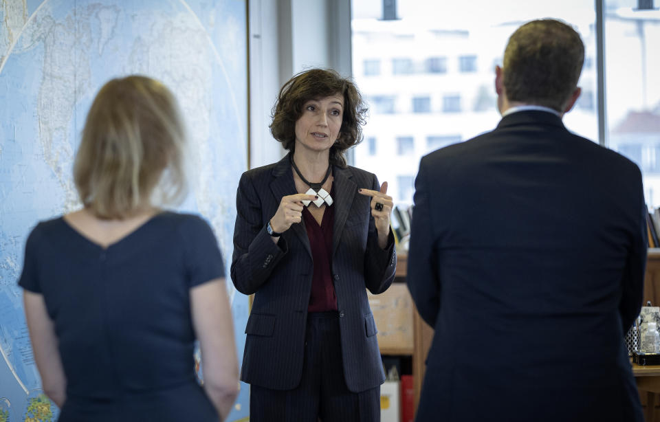 UNESCO Director General Audrey Azoulay answers the Associated Press during a conference on guidelines for regulating digital platforms, Wednesday, Feb. 22, 2023 at the UNESCO headquarters in Paris. The two-day conference in Paris aims to formulate guidelines and principles that would help regulators, governments, lawmakers and business manage content that undermines democracy and human rights while supporting freedom of expression and promoting the availability of accurate and reliable information. (AP Photo/Aurelien Morissard)