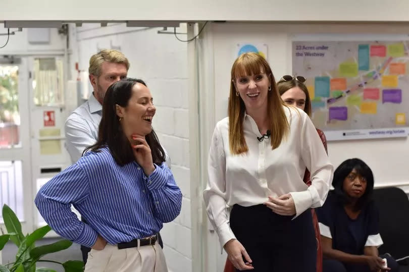 Angela Rayner laughing with members of her team