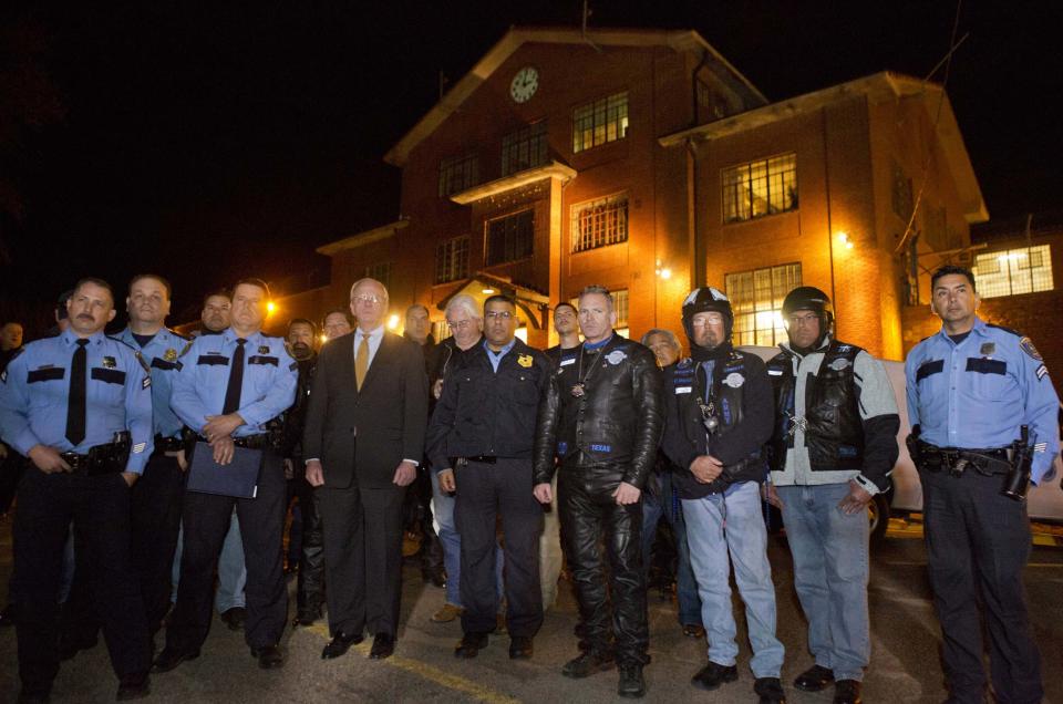 Houston Police officers stand in solidarity for slain officer Guy Gaddis outside the "Walls" unit after the execution of Edgar Tamayo in Huntsville