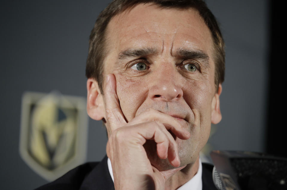 Vegas Golden Knights general manager George McPhee listens during a news conference Thursday, April 13, 2017, in Las Vegas. The Vegas Golden Knights have hired Gerard Gallant as the first coach of the NHL expansion team. (AP Photo/John Locher)