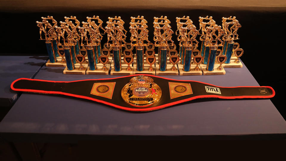 <p>The belt and trophies awarded for the NYPD Boxing Championships at the Theater at Madison Square Garden on June 8, 2017. (Photo: Gordon Donovan/Yahoo News) </p>