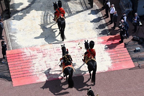 Prince William, Duke of Cambridge and Prince Charles, Prince of Wales ride horseback during the Trooping the Colour parade.