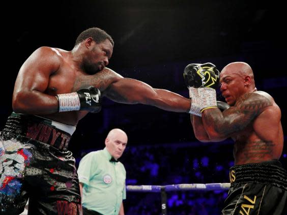 Whyte and Rivas trade shots (Action Images via Reuters)