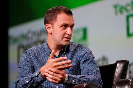 John Zimmer, co-founder and president of Lyft, speaks on stage during a Founders Stories session at TechCrunch Disrupt SF 2013 in San Francisco, California September 9, 2013. REUTERS/Stephen Lam