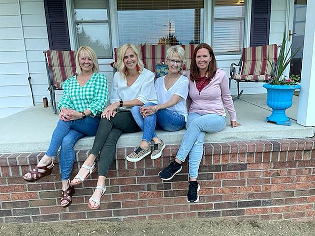 Angie Foster, far right, with half-sisters, Brooke Tinch and Brette Karas, and their mother, Kathy Donisi, during their Christmas visit.