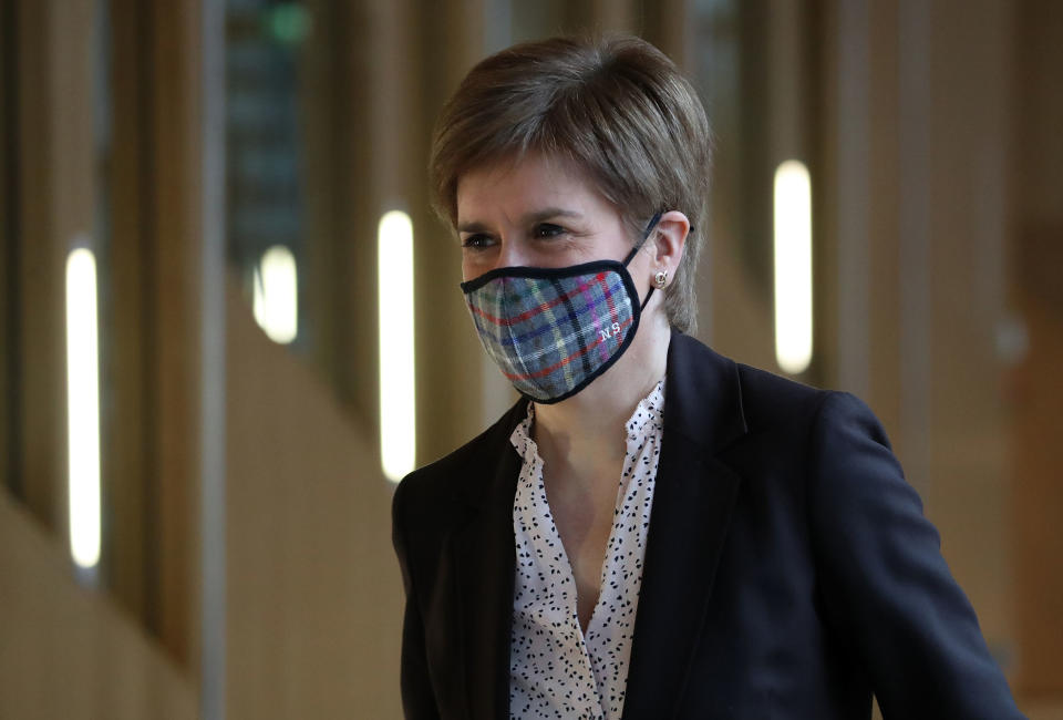 EDINBURGH, SCOTLAND - JANUARY 04: Scottish First Minister, Nicola Sturgeon arrives to deliver a statement at Holyrood, Edinburgh, announcing that Scotland will be placed in lockdown from midnight for the duration of January with a legal requirement to stay at home except for essential purposes on January 4, 2021 in Edinburgh, Scotland. (Photo by Andrew Milligan - WPA Pool/Getty Images)