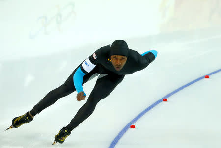 FILE PHOTO: Shani Davis of the U.S. competes in the men's 1,500 metres speed skating competition at the 2014 Sochi Winter Olympics, Russia February 15, 2014. REUTERS/Marko Djurica/File Photo
