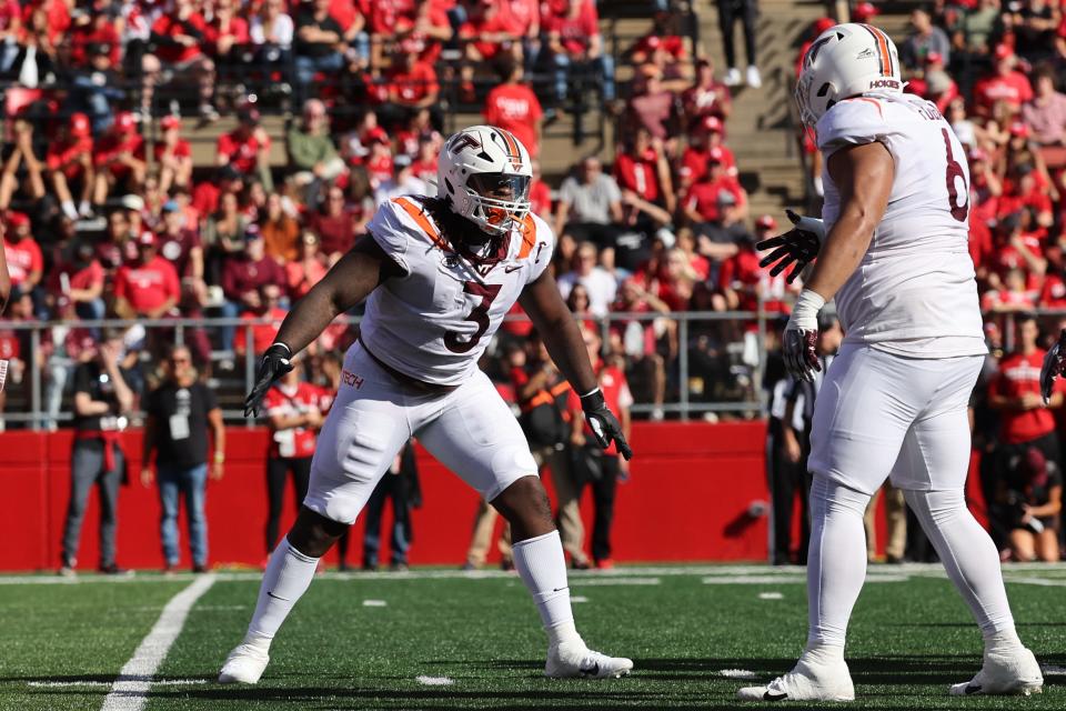 Sep 16, 2023; Piscataway, New Jersey, USA; Virginia Tech Hokies defensive lineman Norell Pollard (3) celebrates a defensive stop with defensive lineman Josh Fuga (6) during the first half against the Rutgers Scarlet Knights at SHI Stadium. Mandatory Credit: Vincent Carchietta-USA TODAY Sports