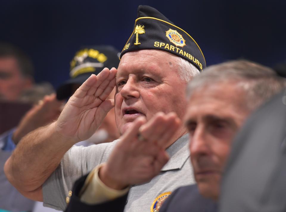 Spartanburg County honored its military veterans at the “Hall of Heroes” event held at the Spartanburg Memorial Auditorium on Oct. 12, 2023. Carroll Owings, Commander American Legion Post 28, center, renders honors with his fellow veterans at the event.