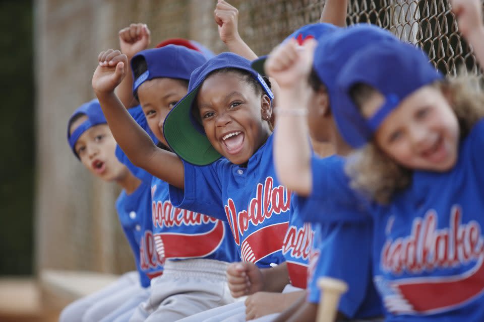 Little League team cheering