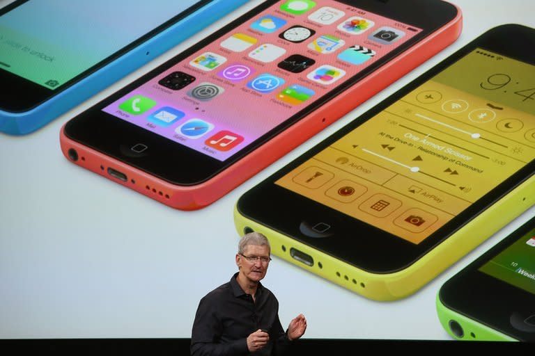 Apple CEO Tim Cook speaks about the new iPhone during an Apple product announcement at the Apple campus on September 10, 2013 in Cupertino, California. Apple unveiled two new iPhones, fielding a slick new top-end model along with one aimed at budget-conscious smartphone shoppers around the world