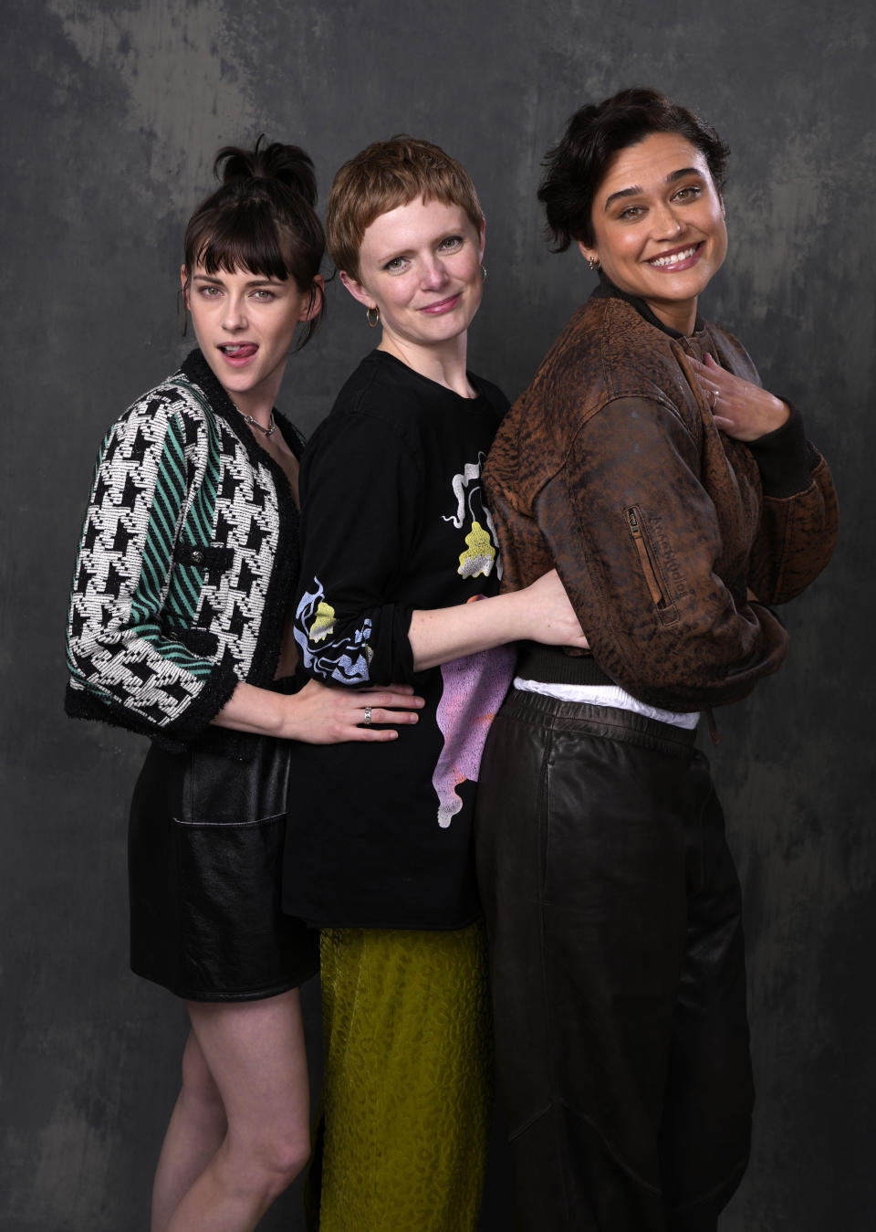 Rose Glass, center, director/co-writer of the film "Love Lies Bleeding," poses with cast members Kristen Stewart, left, and Katy M. O'Brian at the Four Seasons Hotel, Monday, March 4, 2024, in Los Angeles. (AP Photo/Chris Pizzello)