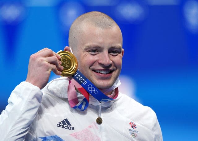 Adam Peaty celebrates winning a gold medal at the Tokyo Olympics