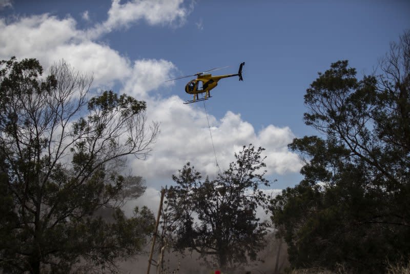 At least 96 people have died in wildfires in Hawaii as crews continued to battle the blazes and search for people who remained missing. Photo by Etienne Laurent/EPA-EFE