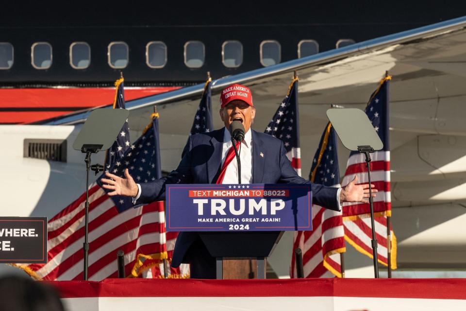 Former President Donald Trump speaks to a crowd of supporters during a rally at Avflight Saginaw in Freeland on Wednesday, May 1, 2024. Trump has played a recording he made with jailed individuals facing charges for storming the U.S. Capitol on Jan. 6, 2021 at some of his rallies, and on Saturday he bragged to GOP donors that the recording hit number one on Billboard's Digital Song Sales Chart.