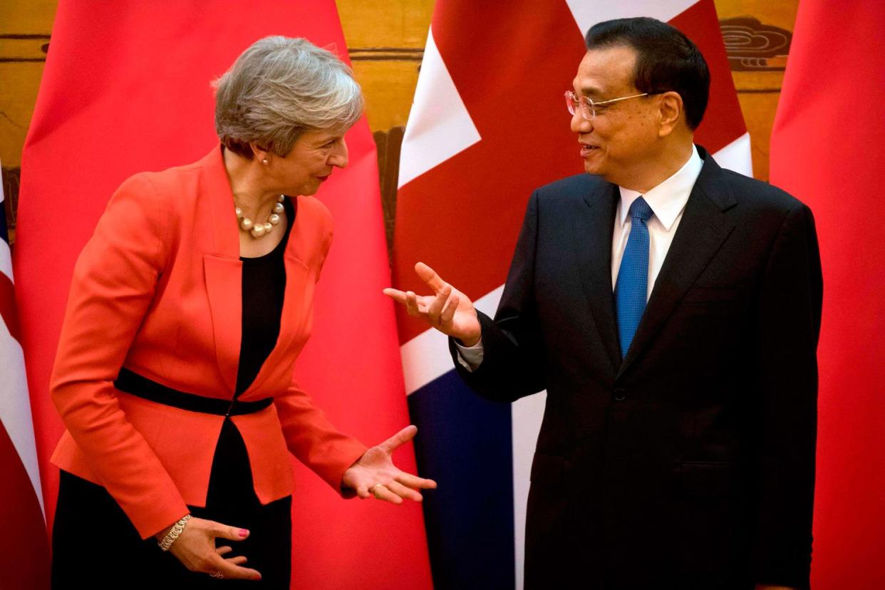 China's Premier Li Keqiang met Theresa May in Beijing last month: AFP