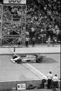 FILE - In this May 30, 1982, file photo, championship driver Gordon Johncock pilots his Wildcat-Cosworth across the finish line to take the checkered flag and win the Indianapolis 500-mile race in Indianapolis. The Associated Press has updated its survey of living Indianapolis 500 winners and their pick as the greatest race in the long history of the event. There are six races that received multiple votes, topped by Al Unser Jr.’s victory over Scott Goodyear in 1992 — the closest Indy 500 in history. The others are Emerson Fittipaldi's win in 1989; Sam Hornish Junior's win in 2006; the 1982 battle between Rick Mears and Johncock; the 2011 race won by the late Dan Wheldon; and the 2014 thriller won by Ryan Hunter-Reay. (AP Photo, File)